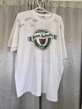 Schultz White T-Shirt with Green and Brown Football Logo Autographed.